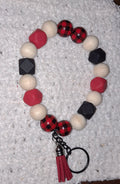 Red, black wood and plaid wristlet