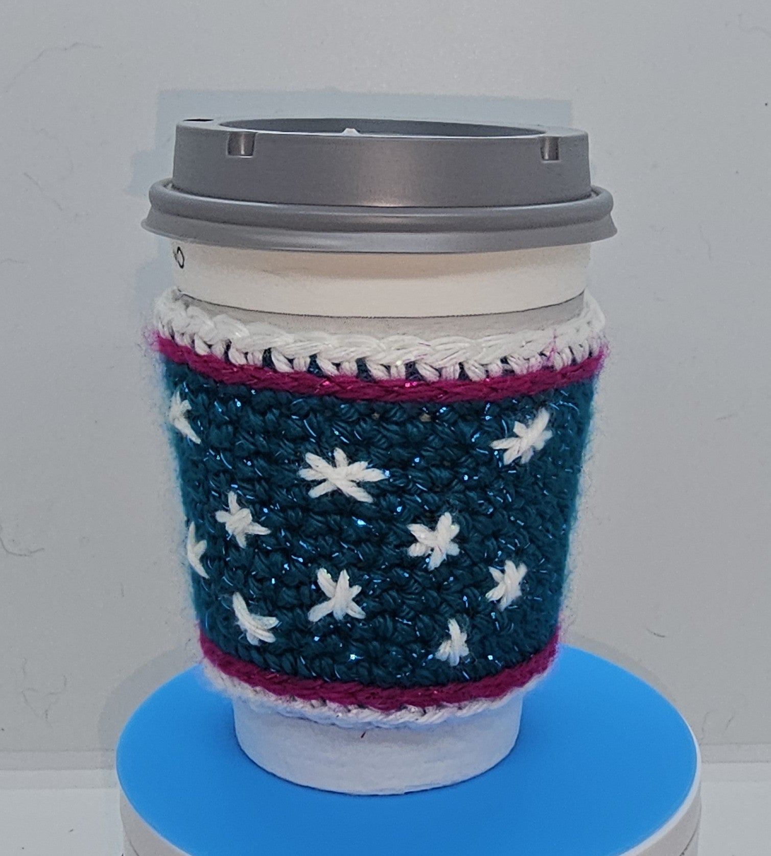 Snowflake coffee cozy