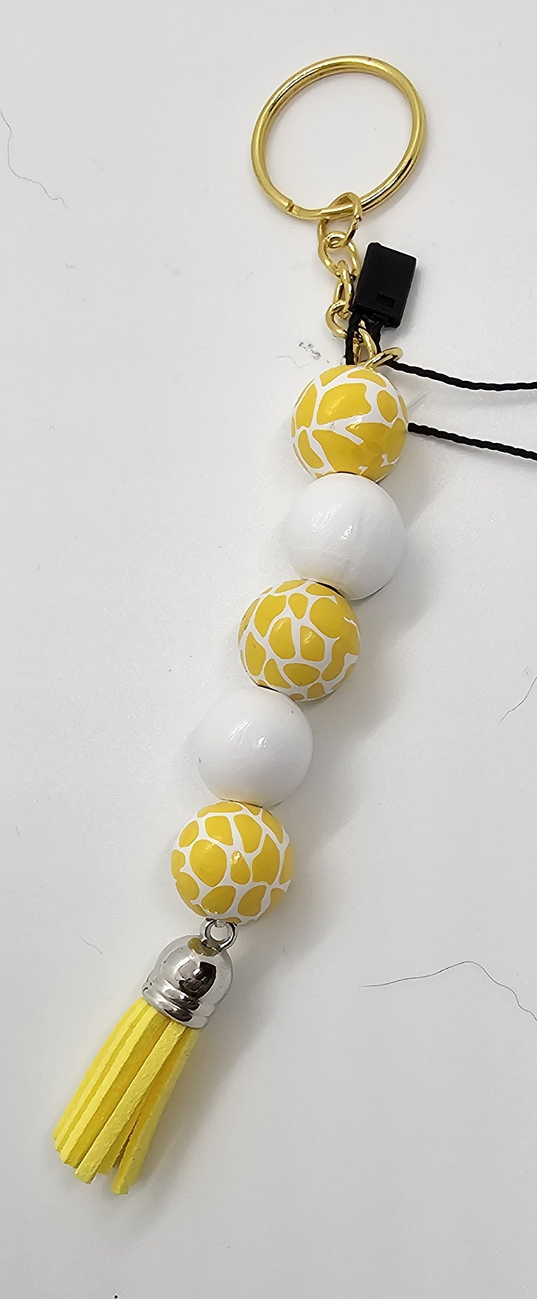 Yellow animal and white keychain