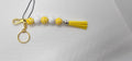 Yellow animal and white keychain