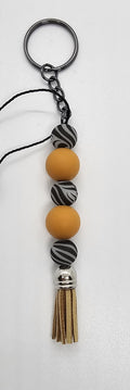 Gold and Zebra glow keychain