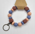 Lavender, pink and mauve wristlet