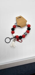 Red black white and animal wristlet