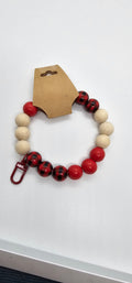 Red wood and plaid wristlet