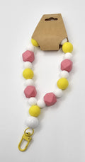 Pink, white and yellow wristlet