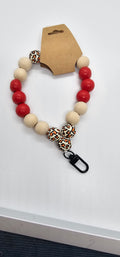 Red natural and animal print wristlet