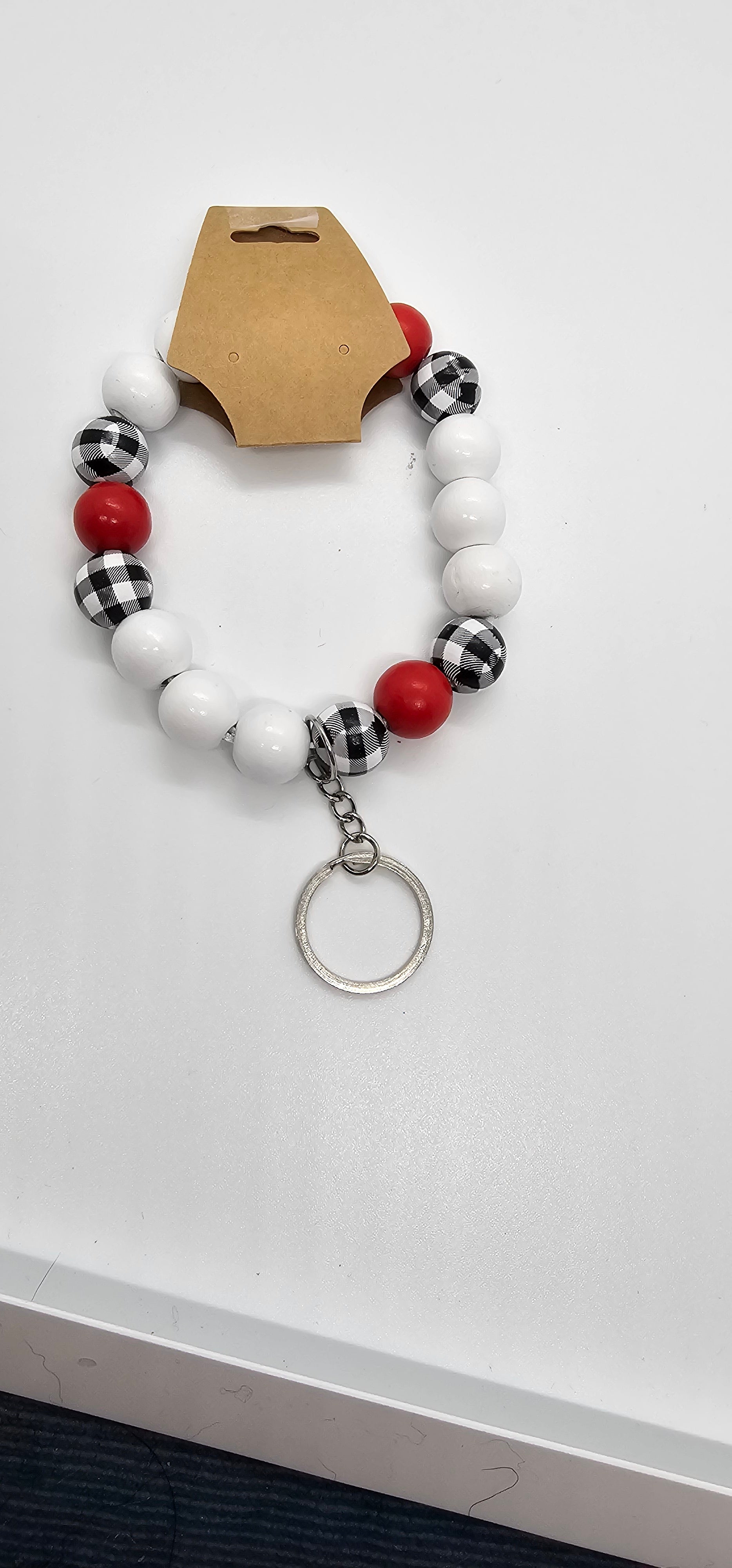 White red and black and white plaid wristlet