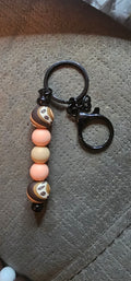 Peach and coffee bean swirls keychain
