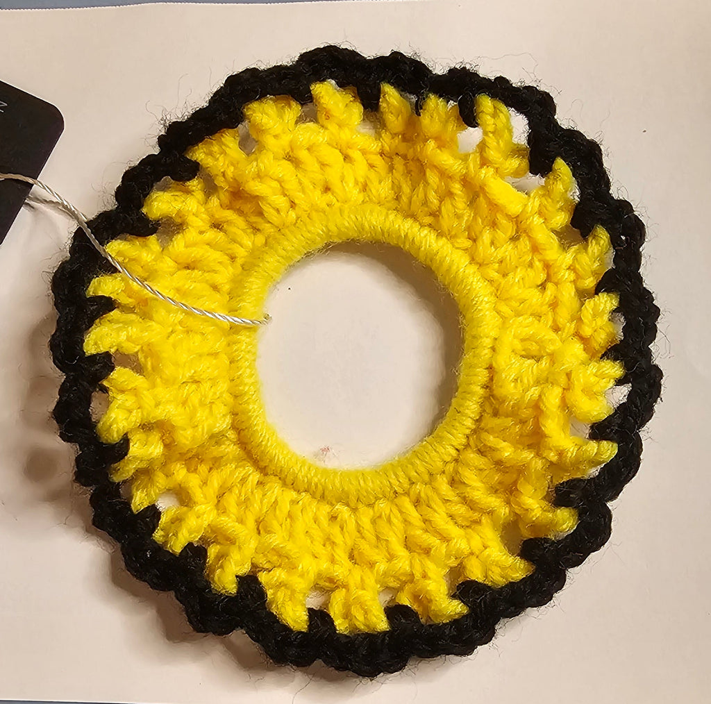 Yellow and black lacy scrunchie