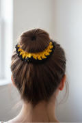 Yellow and black lacy scrunchie